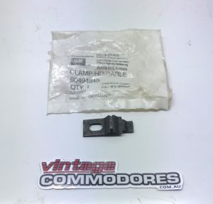 NOS VB VC VH VK VL BONNET RELEASE CABLE BRACKET GM 90494849