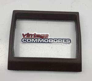 VH INSTRUMENT PANEL CENTER RADIO SURROUND BROWN 65i GM 92004677HEA